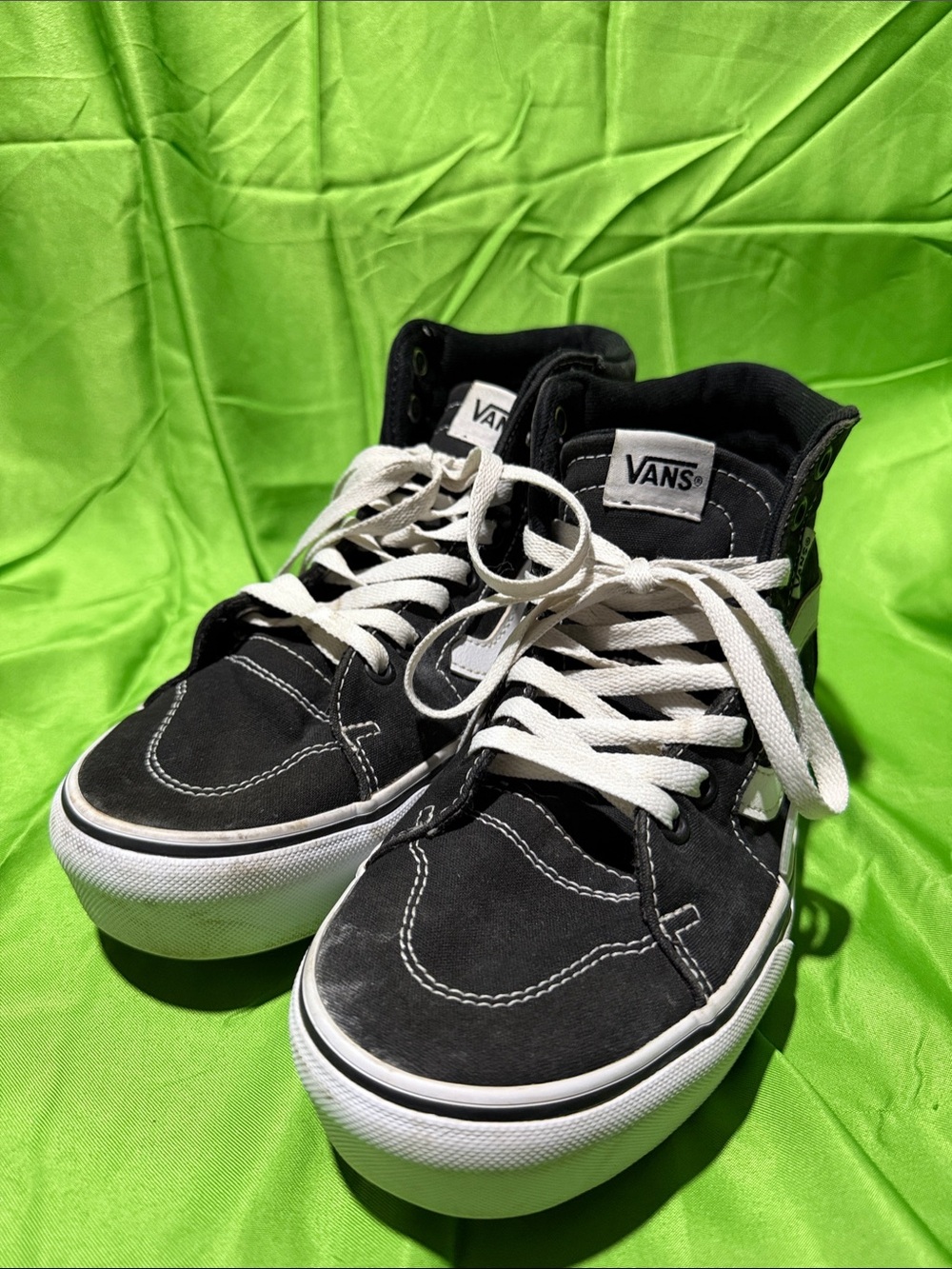 Vans Black and White High-Top Skate Sneakers